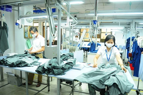 The garment-textile sector sees rosy signs in May and the first five months. (Photo: VNA)