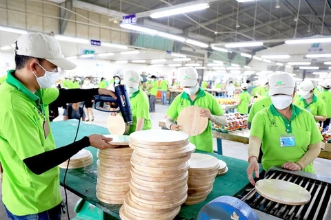 At a wood processing factory in HCM City (Photo: VNA)