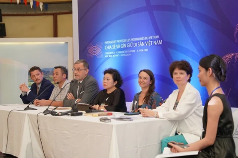French Ambassador to Vietnam Olivier Brochet (third from left) chairs the press conference (Photo: VietnamPlus)