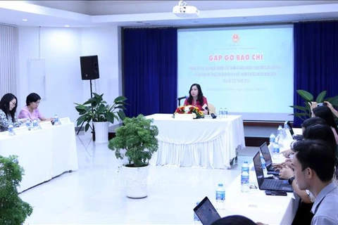 Deputy Minister of Foreign Affairs and Chairwoman of the ministry’ State Committee for Overseas Vietnamese (SCOV) Le Thi Thu Hang speaks at the press briefing held in HCM City on July 2. (Photo: VNA)