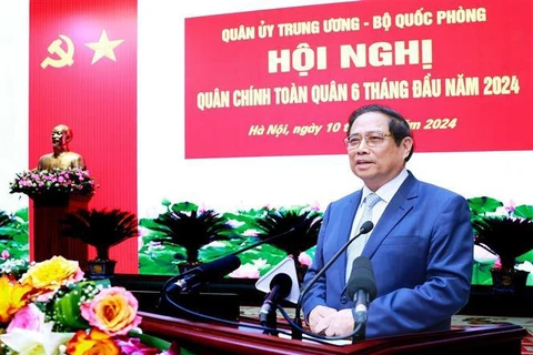 Prime Minister Pham Minh Chinh addresses the national political-military conference on July 10 (Photo: VNA)