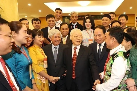 Party General Secretary Nguyen Phu Trong meets delegates to the National Cultural Conference implementing the resolution of the 13th National Party Congress on November 24, 2021. (Photo: VNA)