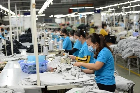 Textile and garment firms have enjoyed a more robust business result on the back of an increase in orders. (Photo: VNA)