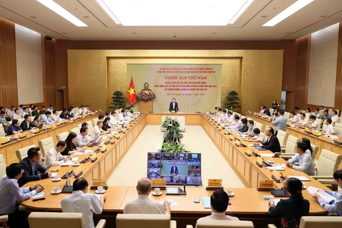 A view of the meeting of the Prime Minister’s working group and advisory council for administrative reform in Hanoi on July 31. (Photo: VNA)