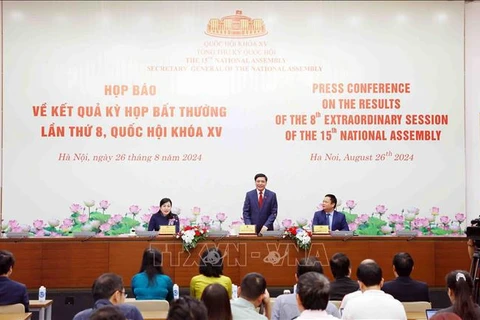 At the press conference announcing the results of the 8th extraordinary session of the 15th NA on August 26. (Photo: VNA)