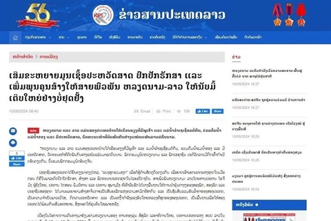 The article published on the e-newspaper of the Lao News Agency. (Photo: VNA)