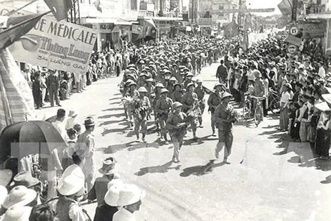 Revolutionary troops march into Hanoi to take over the capital from the French occupation forces on October 10, 1954. (File Photo)