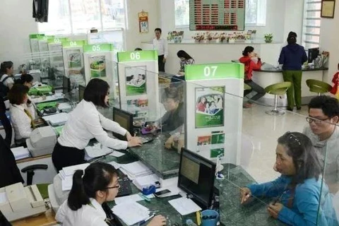 The State Bank of Vietnam sets the daily reference exchange rate for the US dollar at 24,093 VND/USD on September 30. (Photo: VNA)