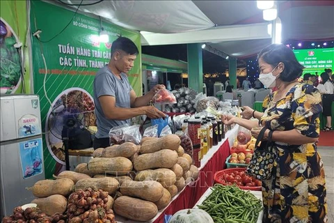 Agricultural products and regional specialties are being introduced at the fair (Photo: VNA)