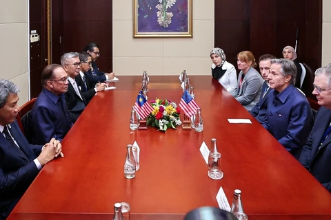 Prime Minister Anwar Ibrahim (second, left) meets with US Secretary of State Antony Blinken (second, right) on the sidelines of the 44th and 45th ASEAN Summits and Related Summits in Vientiane October 10, 2024. (Photo: Bernama) 