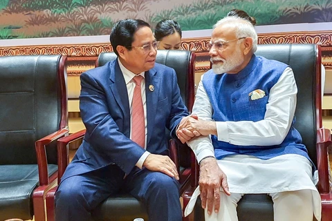 Vietnamese Prime Minister Pham Minh Chinh (L) and Indian counterpart Narendra Modi (Photo: baochinhphu.vn)