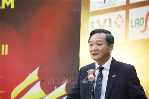 Vietnamese Ambassador to Laos Nguyen Minh Tam addresses the event. (Photo: VNA)