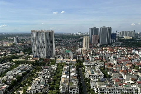 Thorough consideration is needed to ensure legal compliance and investor safety of the joint real estate investment model in Vietnam. (Photo: VNA)