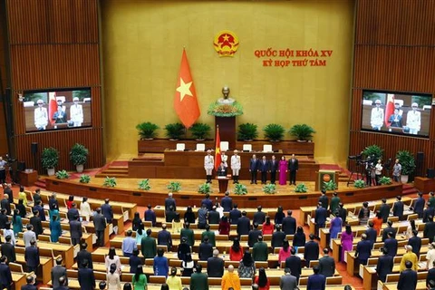 At the sworn-in ceremony (Photo: VNA)