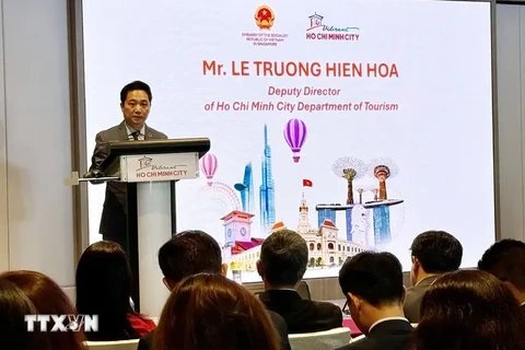 Le Truong Hien Hoa, Deputy Director of the HCM City Department of Tourism, speaks at the event. (Photo: VNA)