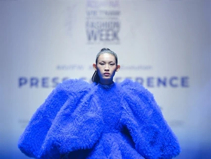 Huynh Tu Anh, winner of The Face Vietnam 2023, in a creation by designer Do Manh Cuong, who will open the AVIFW Fall/Winter 2024 with the collection called 'Giot Nuoc Thuan Khiet' (Pure Water Drop). (Photo courtesy of Multimedia JSC)