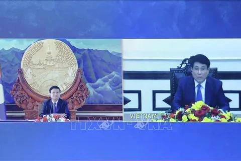 At the online talks between Vietnamese State President Luong Cuong (R) and Party General Secretary and President of Laos Thongloun Sisoulith. (Photo: VNA)