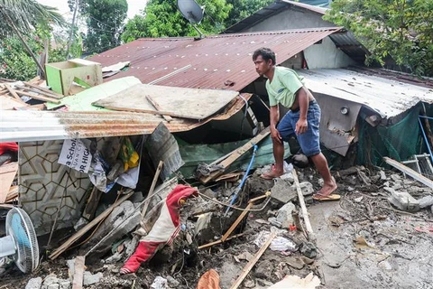 A house in Batangas province, the Philippines, is damaged by a typhoon in October 2024. (Photo: Xinhua/VNA) 