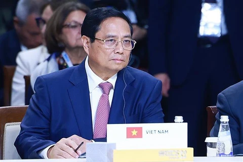 El primer ministro de Vietnam, Pham Minh Chinh, participa en la Cumbre del grupo ampliado de los BRICS (Foto: VNA)