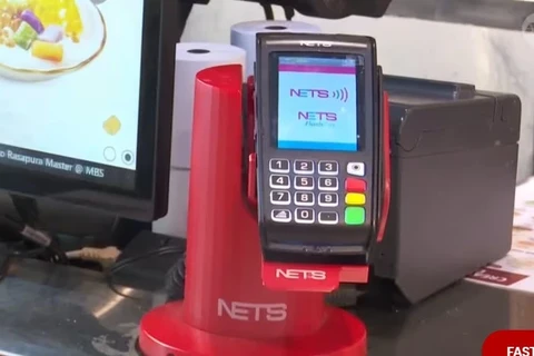 Un automate de paiement NETS. (Photo : canalnewsasia.com)