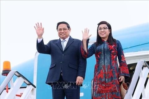 Le Premier ministre Pham Minh Chinh et son épouse. Photo : VNA