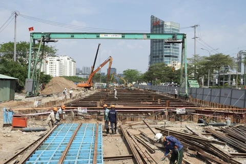 Sur le chantier de construction du projet de tunnel d'intersection Nguyen Van Linh-Nguyen Huu Tho (Photo : journal Sai Gon Giai Phong)