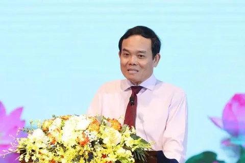 越南政府副总理陈流光发表讲话。图自越通社