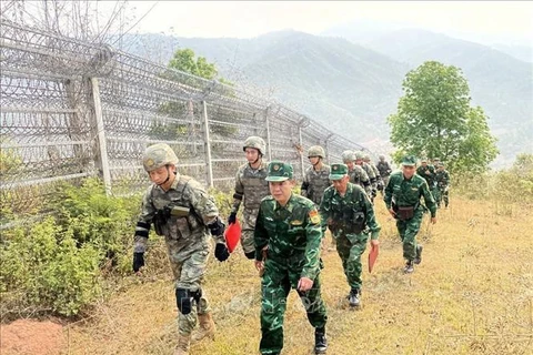 越南和中国边防部队进行双边巡逻。图自越通社