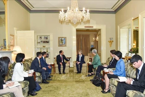 Deputy Prime Minister and Minister of Foreign Affairs Bui Thanh Son (left) meets with Governor of South Australia Frances Adamson. (Photo: VNA)