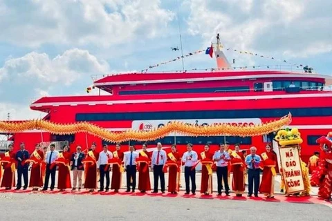 Representatives from agencies and companies at the launching ceremony of the high-speed boat service linking HCM City and Con Dao island. (Photo: plo.vn)