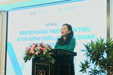 Ho Thi Quyen, deputy director of the Investment and Trade Promotion Centre of HCM City, speaks at the conference titled “Current Foreign Trade Transactions: Changes in Business Strategies and Disputes Management” in HCM City on July 5. (Photo: Courtesy of ITPC) 