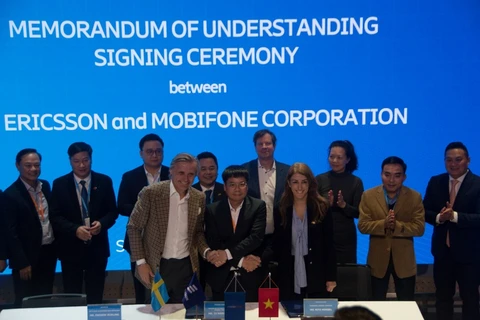 Representatives from Ericsson and MobiFone signed the MoU. (Photo courtesy of Ericsson) 