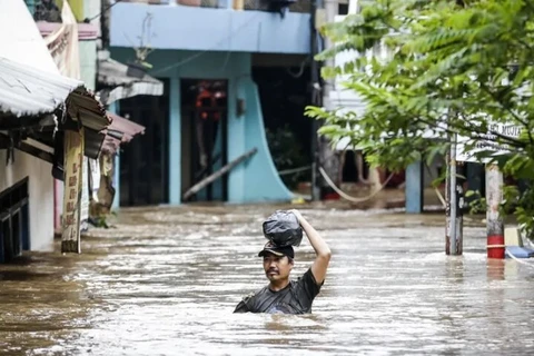 One dead, two missing in Indonesia's flood