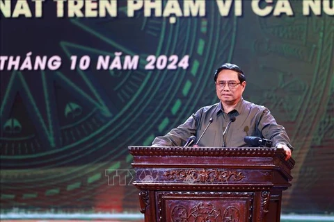 Le Premier ministre Pham Minh Chinh prend la parole lors du programme. Photo: VNA