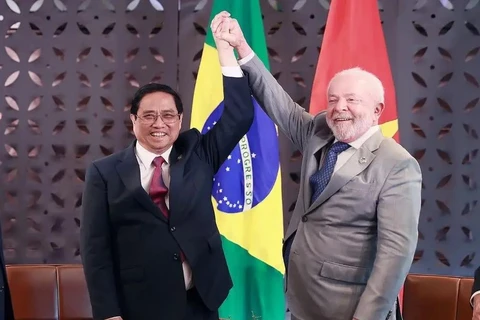 Le Premier ministre Pham Minh Chinh (gauche) et le président brésilien, Luiz Inácio Lula da Silva, le 21 mai 2023. Photo : VNA