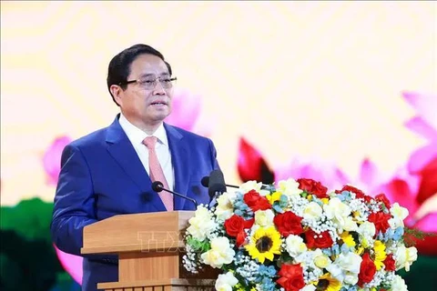 Le Premier ministre Pham Minh Chinh prend la parole à l'occasion du 60e anniversaire de la victoire de Binh Gia. Photo : VNA