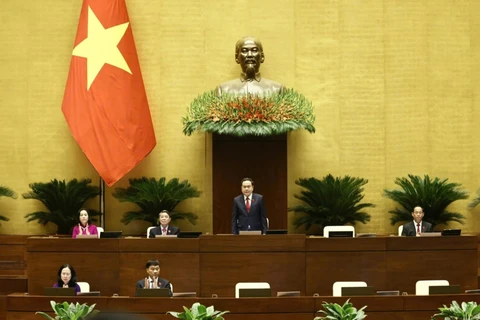 NA Chairman Tran Thanh Man (standing) and NA Vice Chairpersons at the opening ceremony of the 8th session of the 15-tenure National Assembly in Hanoi on October 21. (Photo: VNA)