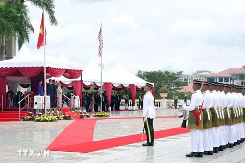 At the welcome ceremony for Party General Secretary To Lam and his spouse. (Photo: VNA)