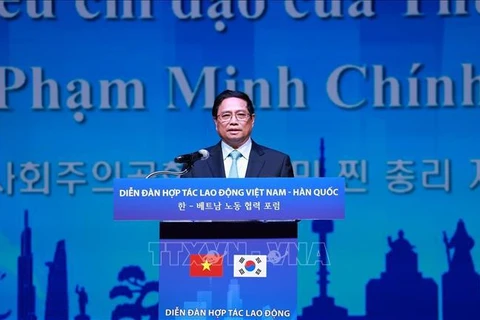 越南政府总理范明政在越南-韩国劳务合作论坛上发言。图自越通社