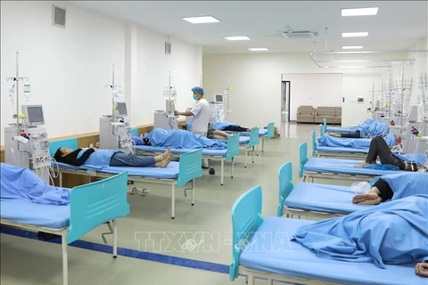 As many as 350 people suffer from food poisoning at Shinwon Ebenezer Vietnam Co. Ltd. in Khai Quang industrial zone in Vinh Yen city of Vinh Phuc province on May 14. (Photo: VNA)