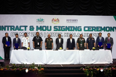 Signature d'accords lors des DSA et NATSEC en Malaisie. Photo: Benama