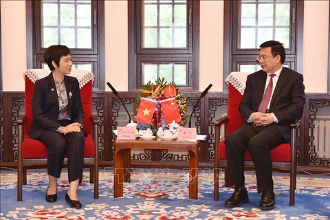 La directora general de la VNA, Vu Viet Trang y el presidente de Xinhua, Fu Hua (Fuente: VNA)