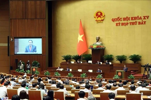 NA Chairman Tran Thanh Man presides over the Q&A session. (Photo: VNA)