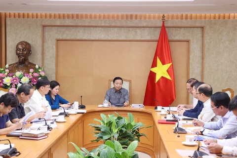 Deputy Prime Minister Tran Hong Ha on October 7 chairs a meeting on the completion of a draft project on establishing and developing a compliance carbon market in Vietnam. (Photo: VNA)