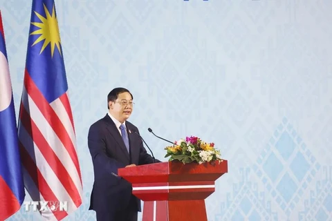 Lao Prime Minister Sonexay Siphandone speaks at the summit. (Photo: VNA)