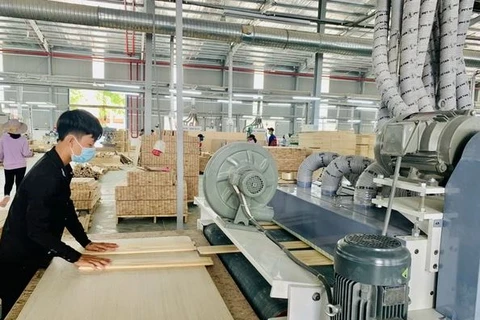 Inside a wood processing firm at Tan Binh Industrial Park in Binh Duong province. (Photo: baobinhduong.vn)