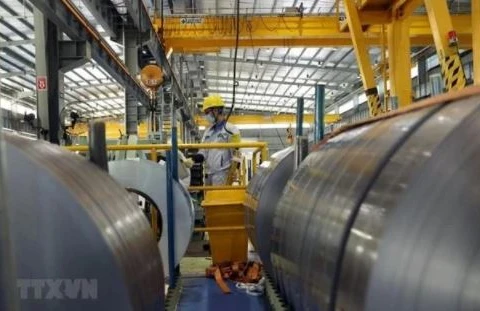 Inside a steel production firm in Vietnam (Photo: VNA)