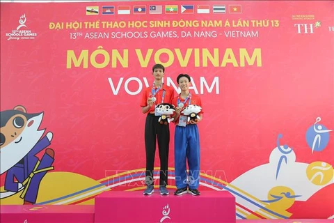 越南两名男运动员获得越武道组手和五门拳银牌。图自越通社