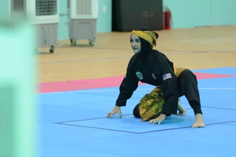 Una atleta malasia en una prueba de Pencak Silat en los XIII Juegos Escolares de la ASEAN en Da Nang el 3 de junio. (Foto: VNA)