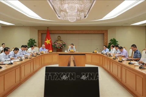 El viceprimer ministro de Vietnam, Tran Hong Ha, preside una reunión sobre el proyecto de establecimiento de un mercado de carbono. (Fuente: VNA)